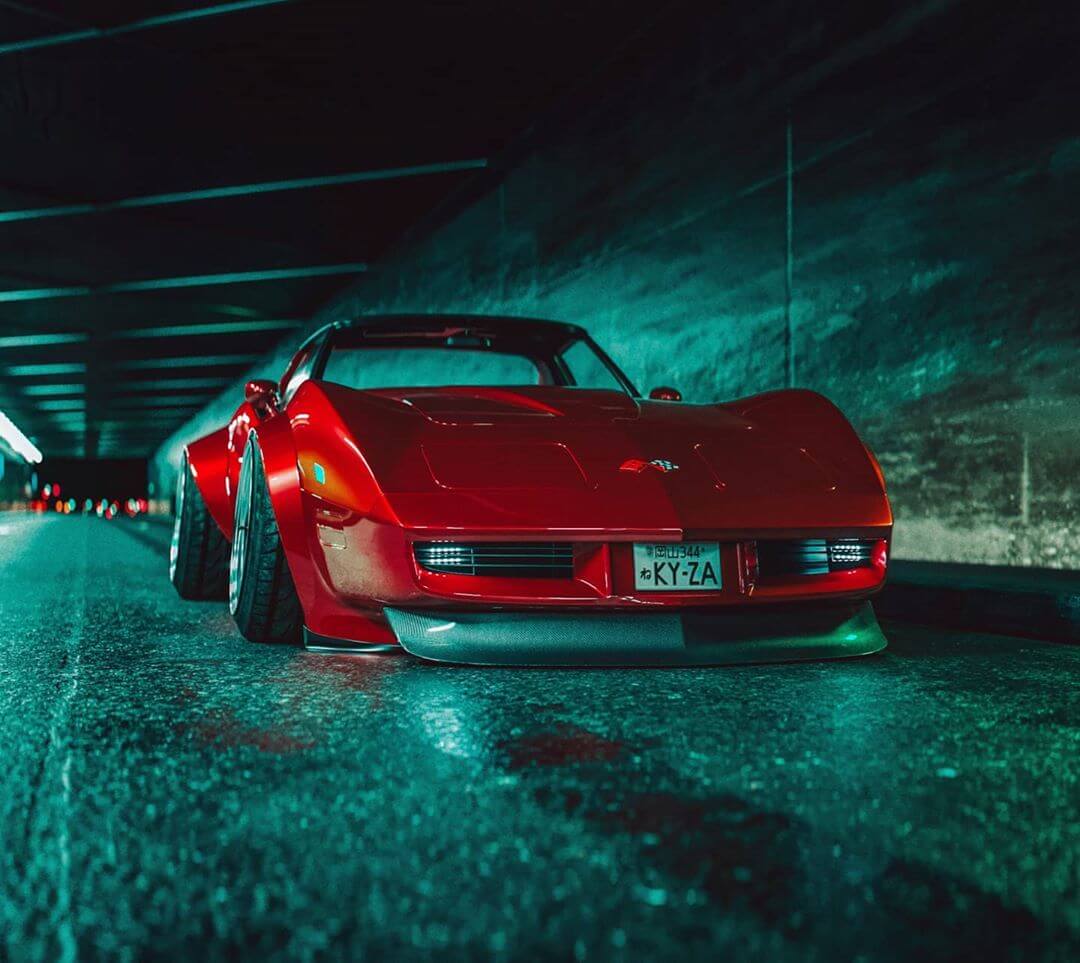 Lowered Chevy Corvette C3 in red color