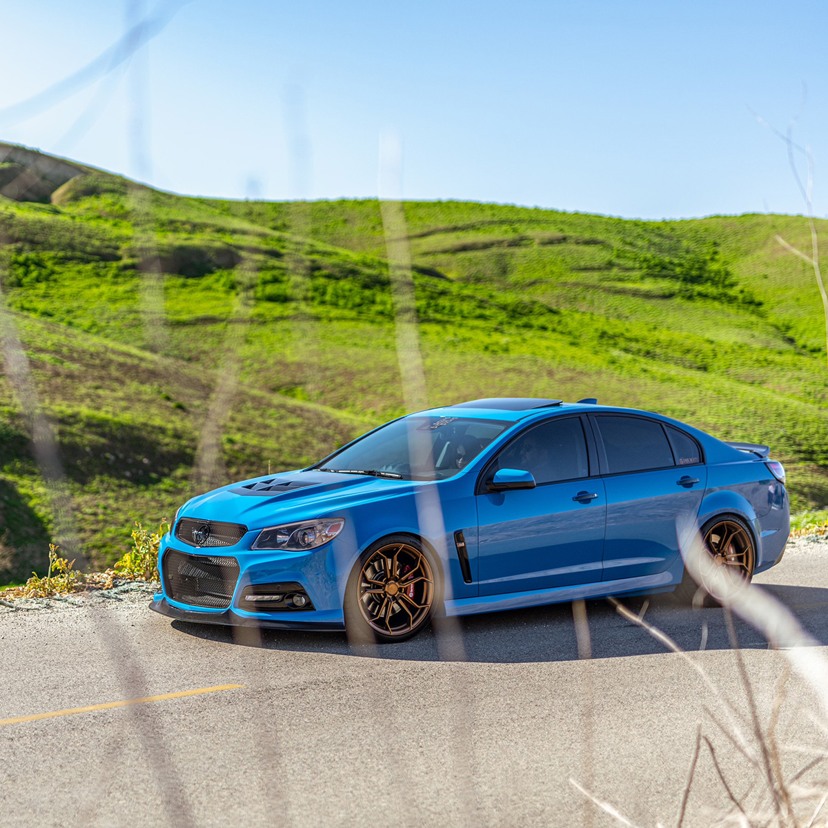 Lowered Chevy SS on Kings SSSl springs and 20” Avant- Garde M632 rims