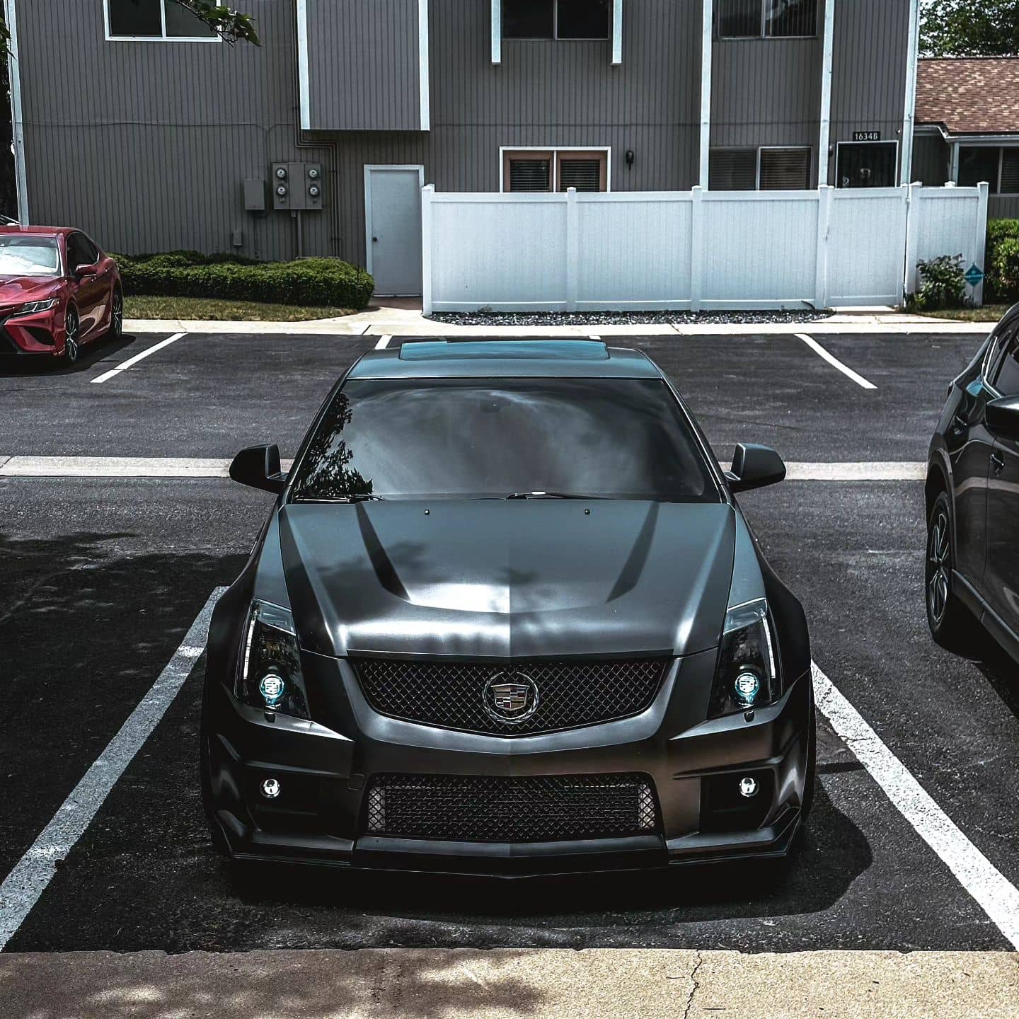 2nd generation 2014 Cadillac CTS-V with custom black smoke headlights by apexretrofit