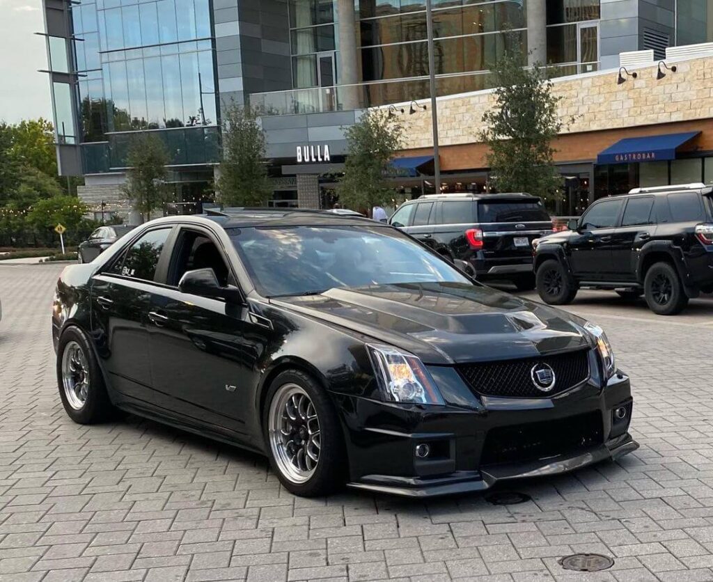 Modded 2nd Gen Cadillac cts-V sedan with wide body fenders and custom wheels