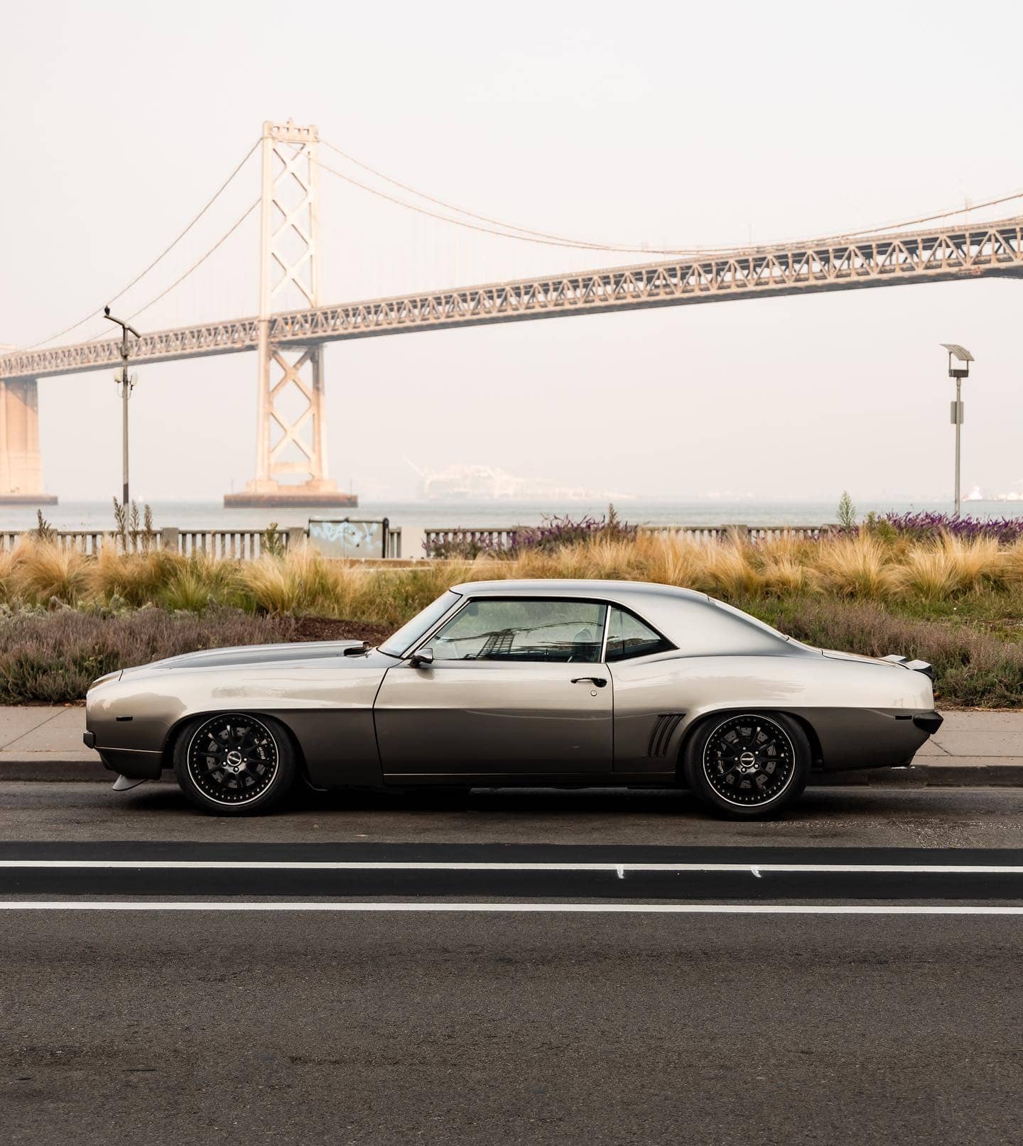 Lowered 1969 Chevy Camaro Z28 Pro Touring build on Ridetech coilovers and 4 link suspension in the rear. The Forgeline wheels, sporting 245/40/18 front and 275/40/18 rear tires, ensure that all the power is put to good use.