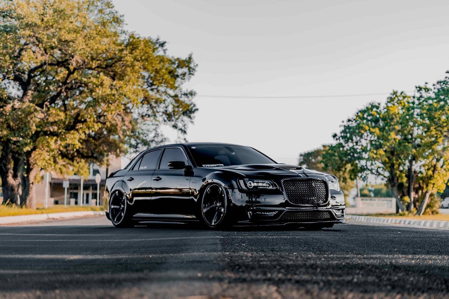 Slammed Chrysler 300 with air suspension and blacked out exterior