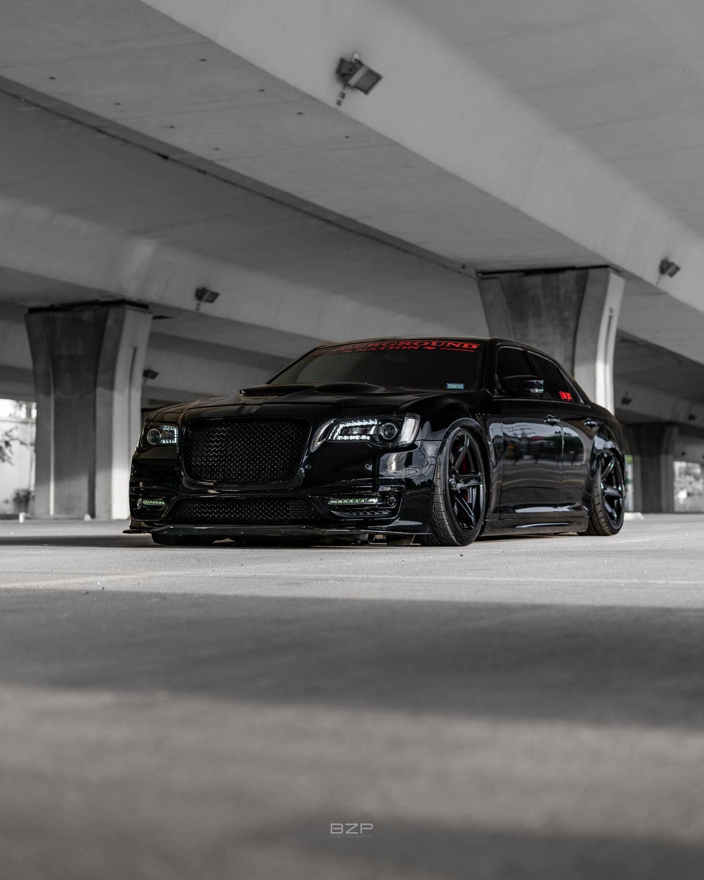 2021 Chrysler 300 s fully blacked out with SRT grille and black LED custom headlights
