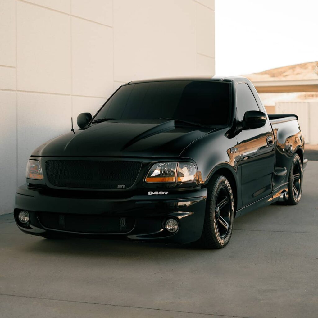 Fully Built Black Ford F150 SVT Lightning With Subtle Exterior Mods