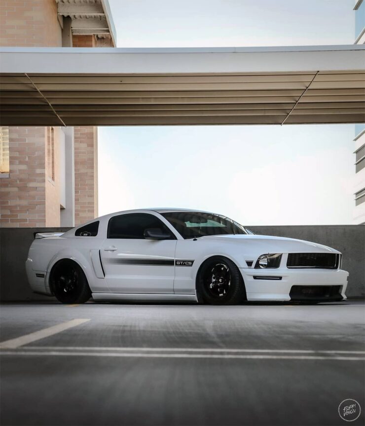 Bagged Ford Mustang GT California Special S197 on Cosmis Racing XT005r Rims