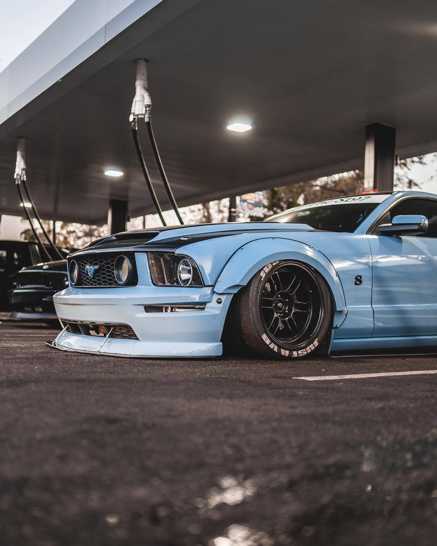 Bagged Ford Mustang V6 S197 on custom air suspension with wide stance