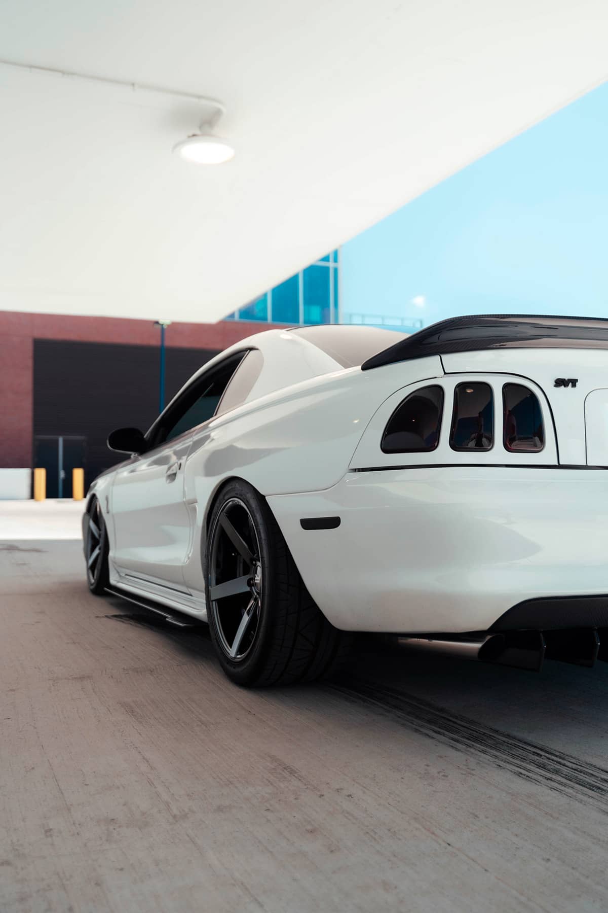 Modified 1997 Ford Mustang Cobra SN95 with blacked out led taillights