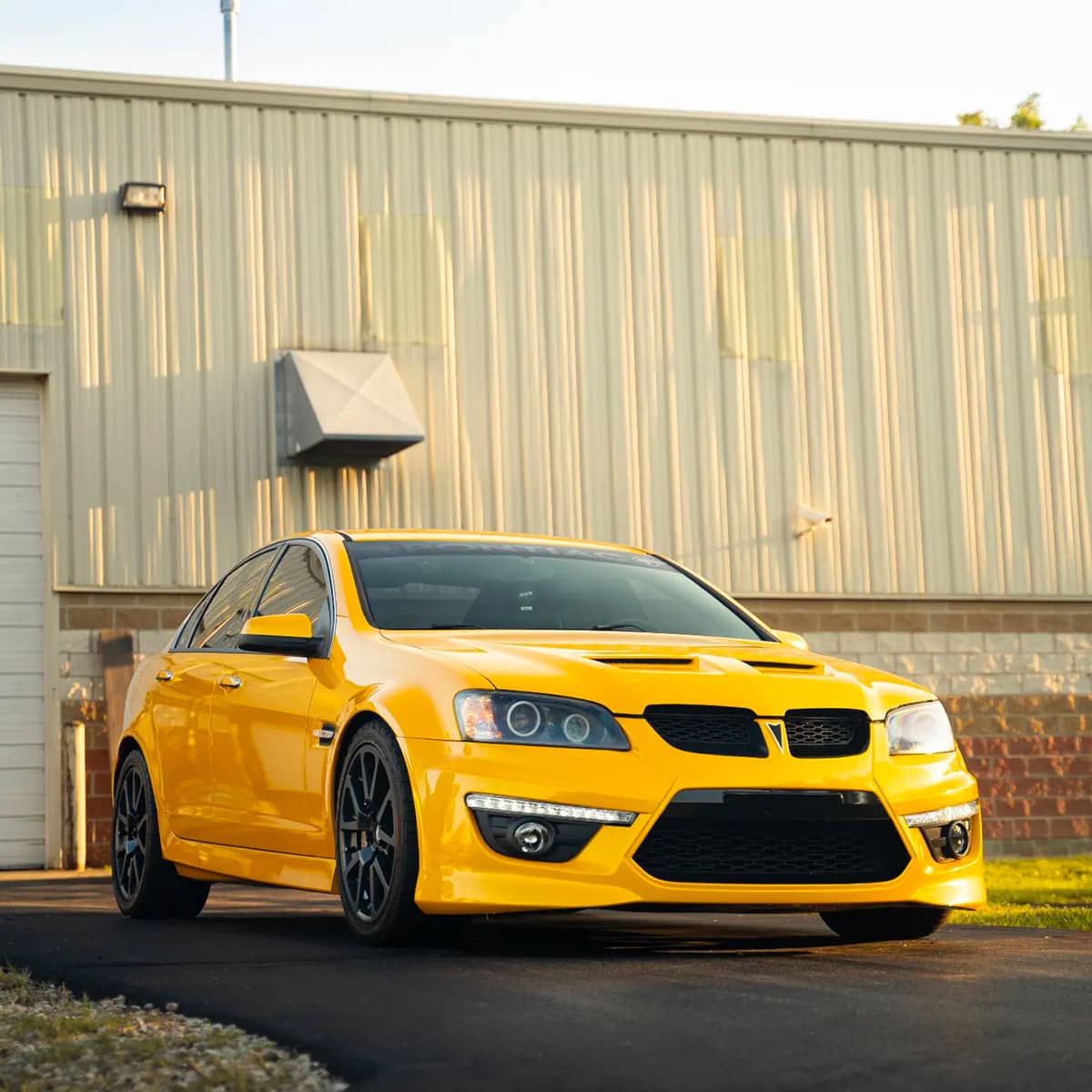 Yellow Pontiac G8 GT HSV VE GTS with black grille