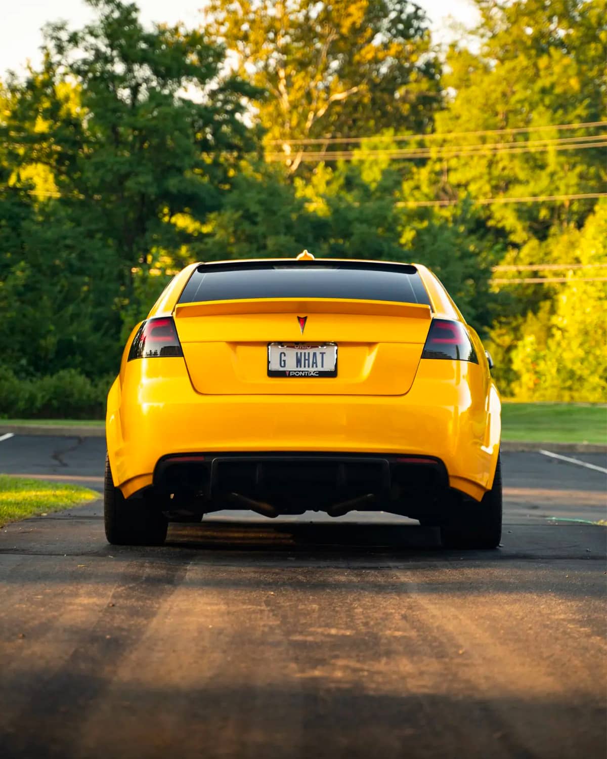Yellow Pontiac G8 GT with smoke LED taillights