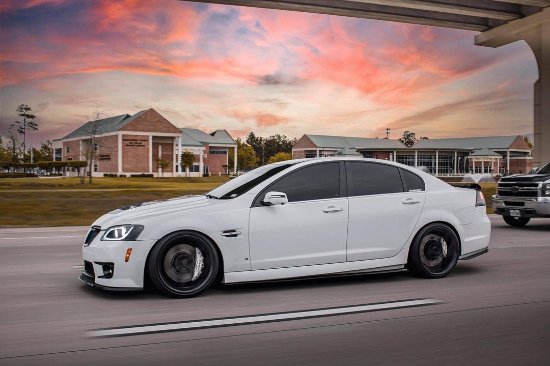 White Pontiac G8 with lowered suspension on coilovers